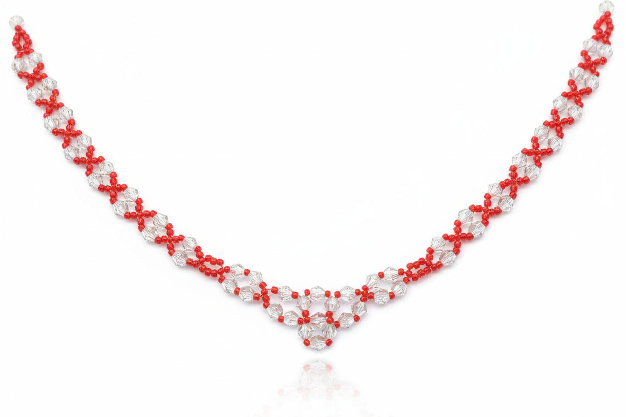 Rött kristallhalsband med vit bakgrund